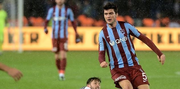 Rekortmen Okay geri dönüyor.