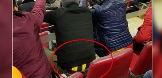 'Galatasaray'ın stadında Fenerbahçeli taraftar! Montunun içine gizledi