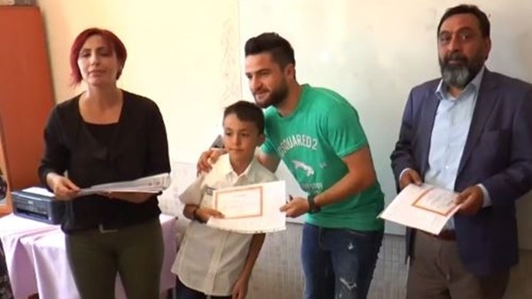 Konyasporlu Ömer Ali Şahiner karne dağıtım törenine katıldı