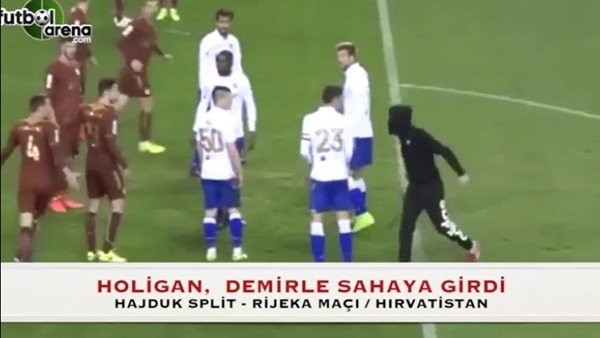 Demirle sahaya giren holigan