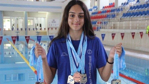 14 yaşındaki genç sporcunun 63 madalyası bulunuyor