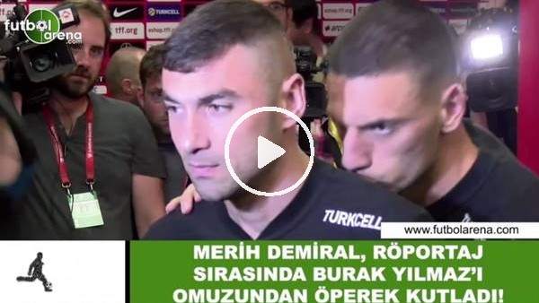 Merin Demiral, röportaj esnasında Burak Yılmaz'ı omuzundan öperek kutladı